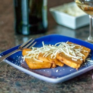 A photos of panelle in a blue plate.