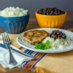 Latin American pork chops with black beans and rice