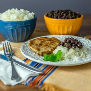 Latin American pork chops with black beans and rice