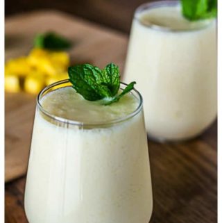 Delicious mango lassi made with buttermilk and honey. | ethnicspoon.com