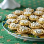 Mini lemon curd tartlets with whipped cream. | ethnicspoon.com