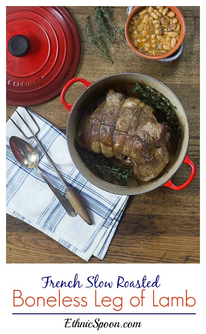 Slow cooked in a dutch oven for a tender and succulent herbed French style boneless leg of lamb. | ethnicspoon.com