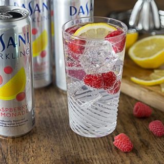 Try a refreshing sparkling berry lemony spritz! Mix up a nice mocktail with some Dasani Sparkling, fresh lemon juice and toss in a few raspberries too! #CollectiveBias #NewWayToSparkle #ad| ethnicspoon.com