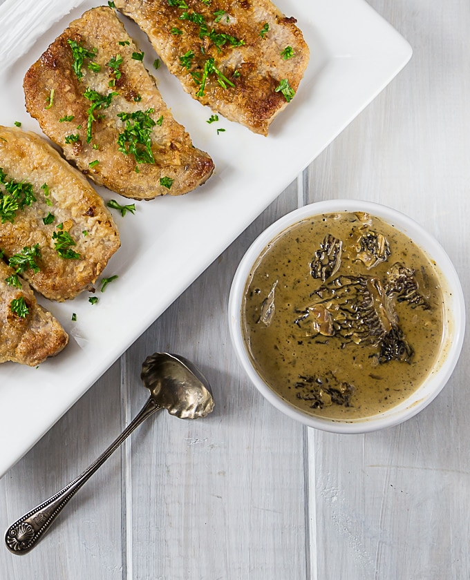 Bring on the pork chops! YOu will love this pork chop recipe! Sweet, creamy and delicious one pan pork chops in morel mushroom sauce. A simple pan sauce brings an exotic meal to the table in less than 30 minutes. | ethnicspoon.com