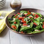 You will love this spinach salad with raisins, almonds and tomatoes with a white balsamic, pomegranate dijon dressing. I love homemade salad dressings and this one is fabulous! | ethnicspoon.com