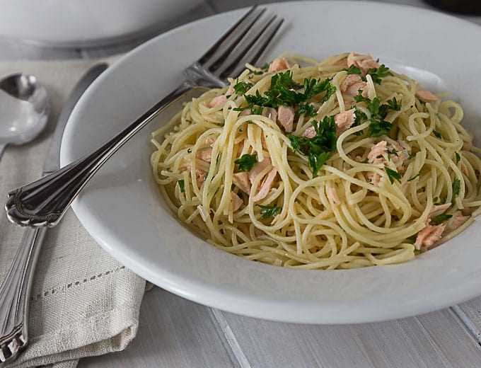 A rich creamy sauce with salmon, dill and angel hair pasta with a little cayenne kick! This pasta is AMAZING! A quick and easy weeknight meal too! So Good! | ethnicspoon.com