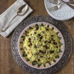 Try this delicious Persian style saffron rice with almonds and Craisins brings a contrast of flavors and textures. This is similar to the dish Albaloo Polow. | ethnicspoon.com