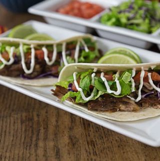 You will love these authentic Mexian Pork carnitas! Tender and delicious with a nice crispy finish! Super easy to make in the slow cooker and then crisp up in the oven. | ethnicspoon.com