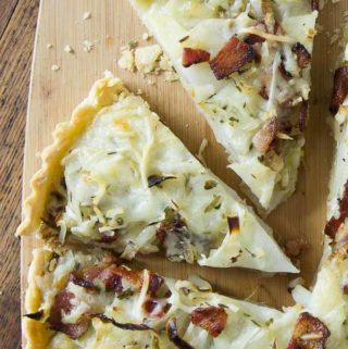 Try a savory tart! You’ll love this tasty potato, bacon & gruyere tart! A lovely savory cheesy tart with sweet onions, salty bacon and a nice hint of herbs with my own special blend of herbes de provence. | ethnicspoon.com