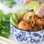 Here is a tasty weeknight meal! Super easy shrimp pad thai can be ready in about 5 minutes! Add some fresh cilantro, limes and chopped peanuts! So Good! | ethnicspoon.com