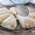 My family’s favorite scones! Everything’s better with bacon but how about bacon scones with maple glaze? You are going to love these cheesy bacon scones. These have Gruyere, fresh thyme, bacon and the sweet maple glaze for a nice savory and sweet combination. | ethnicspoon.com
