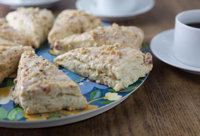 Like scones? You will love these! Everything’s better with bacon but how about bacon scones with maple glaze? You are going to love these cheesy bacon scones. These have Gruyere, fresh thyme, bacon and the sweet maple glaze for a nice savory and sweet combination. | ethnicspoon.com