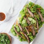 Try an exotic recipe for the grill this summer! You will love the spicy flavors in this recipe. Thai beef salad with the exotic flavors of lemongrass, tamarind, spicy chili garlic sauce and palm sugar make for a spectacular flavor profile and so easy to make. I love to use flank steak and cut it on the bias into strips for my salad. | ethnicspoon.com