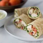 Try a spicy new wrap! Creamy and spicy curry chicken salad wrap add a bit of ethnic flair to your lunch or dinner. You can also slice these narrow and serve as an appetizer too! The secret sauce: a bit of my homemade curry blend whipped into some Greek yogurt. This is a really healthy recipe wrapped in a large flour tortilla! | ethnicspoon.com