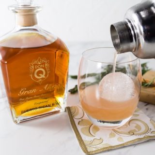 Fresh citrus is one of my favorite ingredients in a cocktail. You will love the subtle flavors in this grapefruit rosemary mojito made with Don Q Gran Añejo rum. This is crisp and refreshing so shake one up and enjoy! | ethnicspoon.com