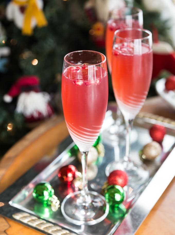 Try a crisp and refreshing prosecco pomegranate mimosa! Sparkling bubbly prosecco with a splash of tang pomegranate is a tasty combination for this libation. | ethnicspoon.com