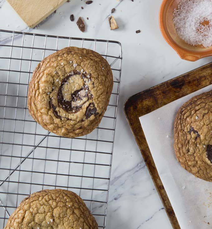 If there was one new cookie recipe to try this is it! You might like chocolate chip cookies but this English toffee, brown butter chocolate chunk cookie with sea salt is nothing short of amazing! Trust me this needs to be on your bucket list of things to bake. | ethnicspoon.com