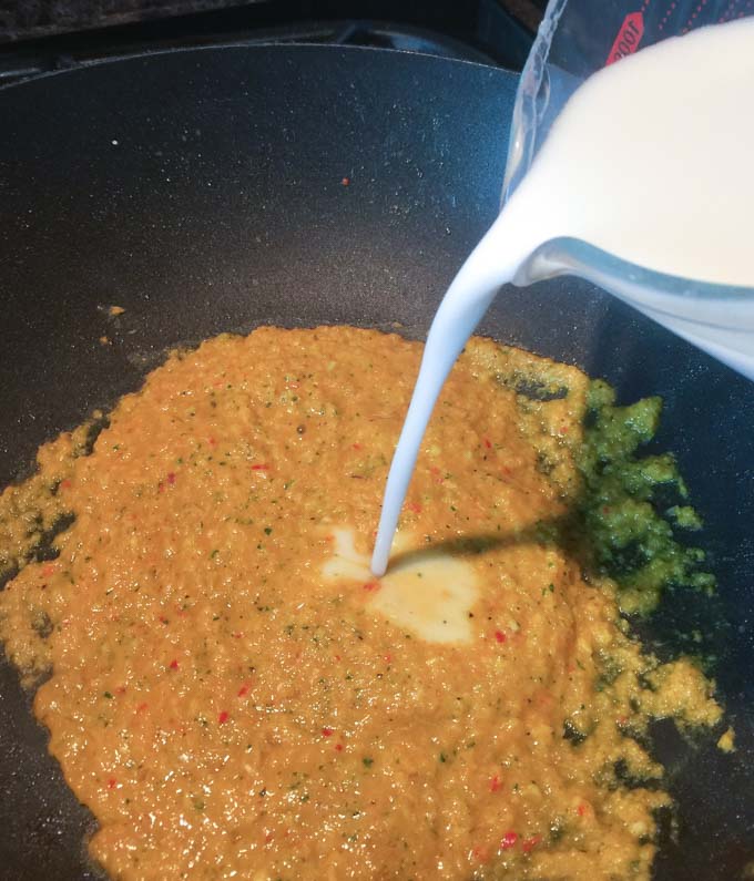 Add coconut milk step to the curry paste for your chicken amok.