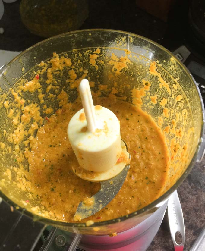 Prepare the curry paste for the chicken amok in a small food processor. 