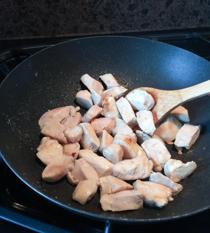 Chicken amok stir fry chicken step.