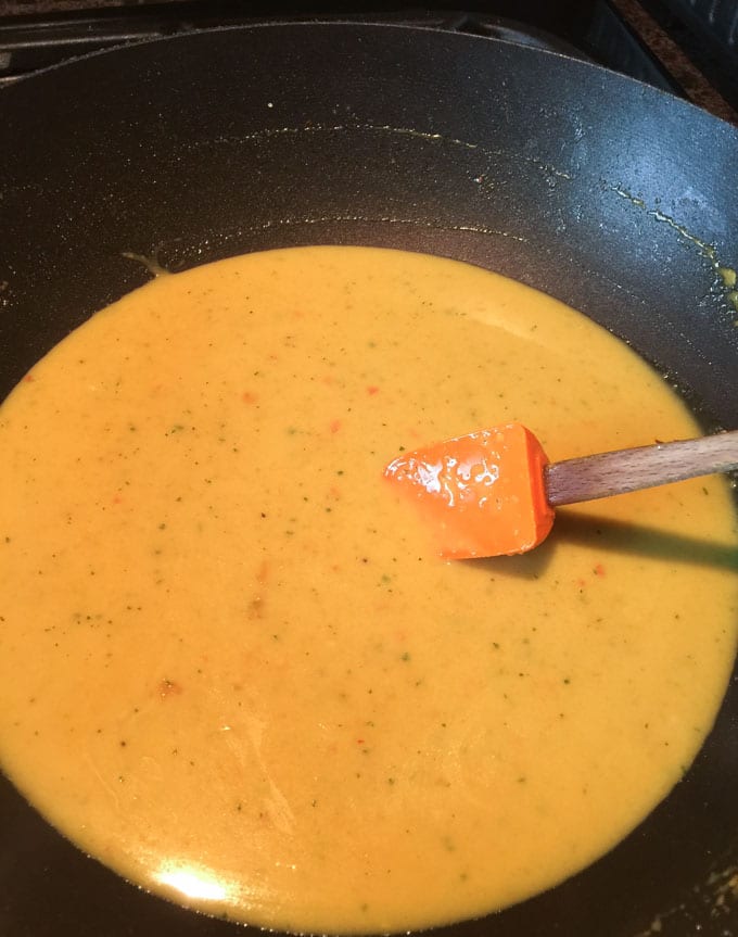 Chicken amok curry sauce thickening step. 