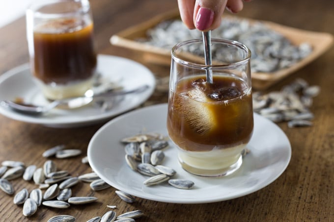 Cold coffee drink are popular during the hot summers in Vietnam and I think you’ll enjoy. Ca phe sua da is easy to make at home too! Espresso, ice and some sweetened condensed milk are all you need. | ethnicspoon.com