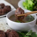 A photo of Vietnamese bun cha in a white bowl.