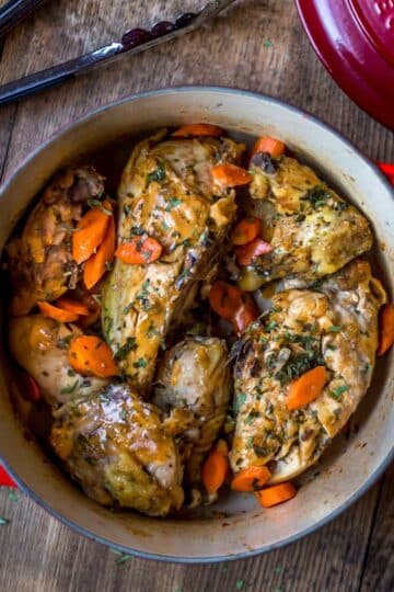 A photo of tarragon chicken in a Dutch oven.