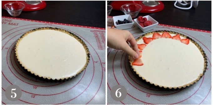 A photo showing the filling inside a tart shell and placing strawberries around the edge.