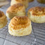 A photo of chicken puff pastry on a wire cooling rack.