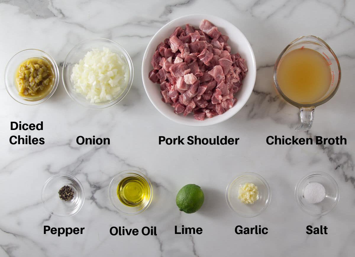 A photo of the ingredients to make pork chili verde with text overlay.